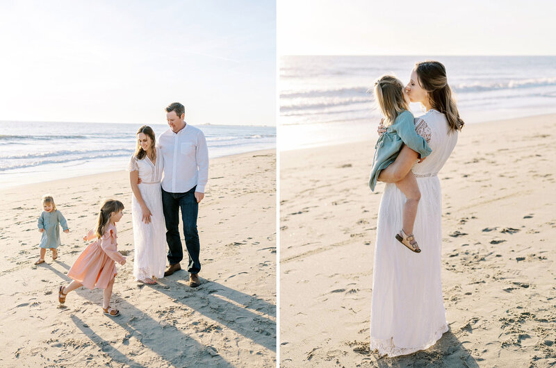 Two little girls running in circles around their parents on the beach during family portraits in Santa Barbara