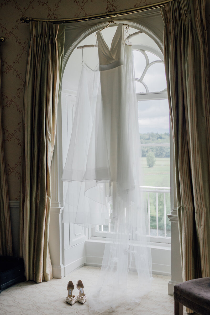 wedding-dress-hanging-in-bridal-suite