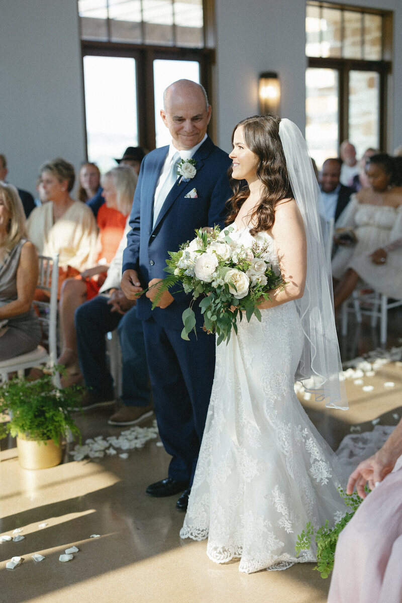 Indoor chapel ceremony at Canyonwood Ridge with modern architecture and soft light