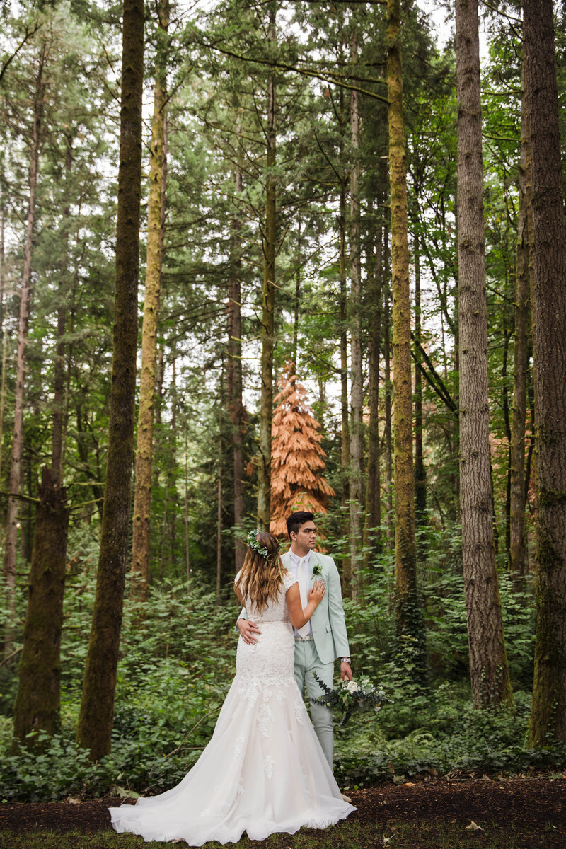 bride and groom during bridals in outdoor forest in Gatlinburg