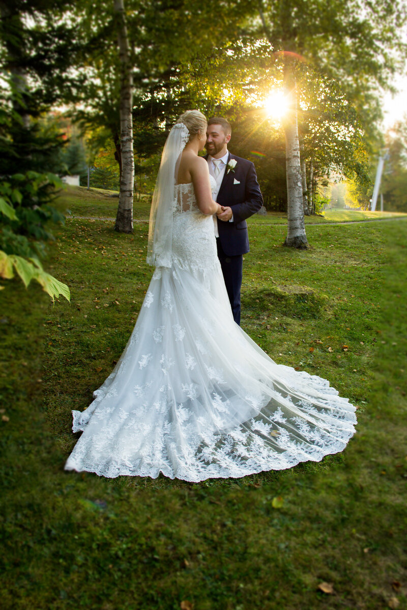 Bride and groom standing outside together | Sugarloaf Maine Wedding Photography