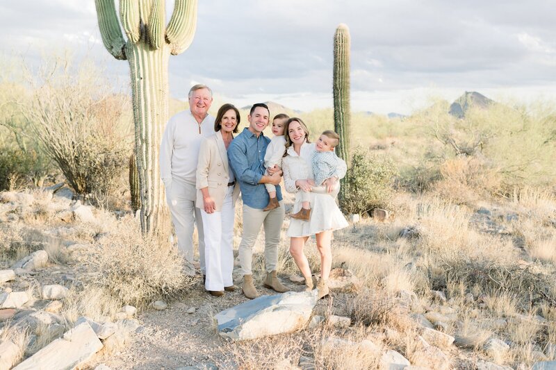 Extended Family posing for family photos  in scottsdale az