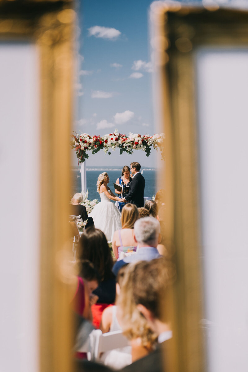 beautiful cliff house wedding ceremony by  Maine wedding photographer Kim Chapman