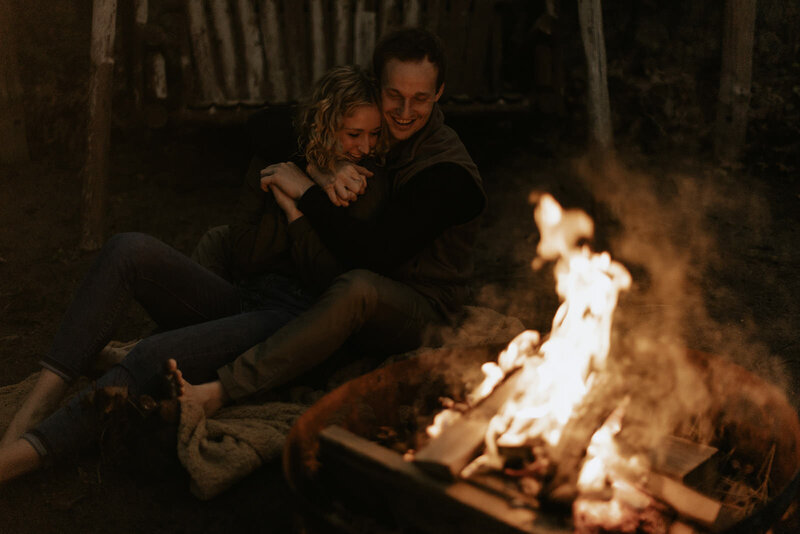 Cozy campfire engagement photos captured by a Grand Rapids wedding photographer.