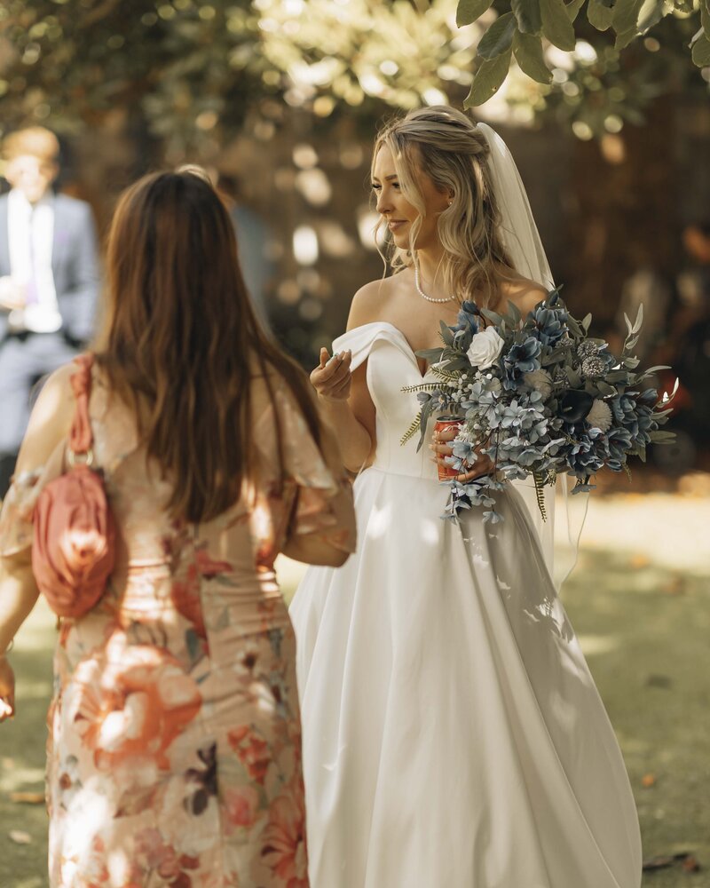 bride speaking to guests