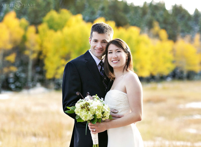 Beautiful Fall Color Aspen Tree Backdrop for wedding portrait at Meadow Creek Lodge & Event Center in Pine Colorado