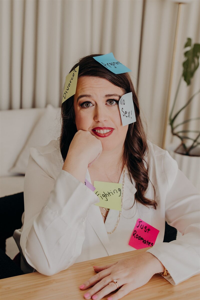 relationship therapist sitting down with colorful sticky notes on her face