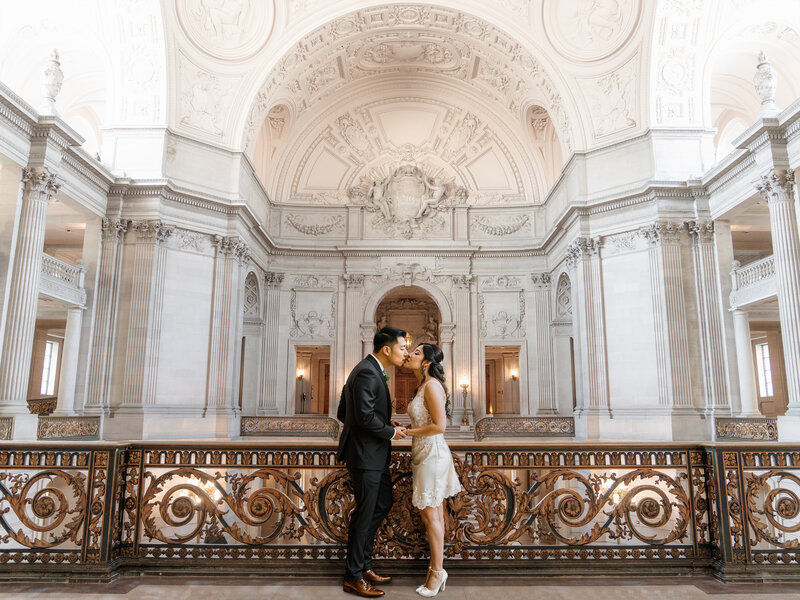 Portrait of bride and groom in front of the City Hall in San Francisco - Photo by 4Karma Studio