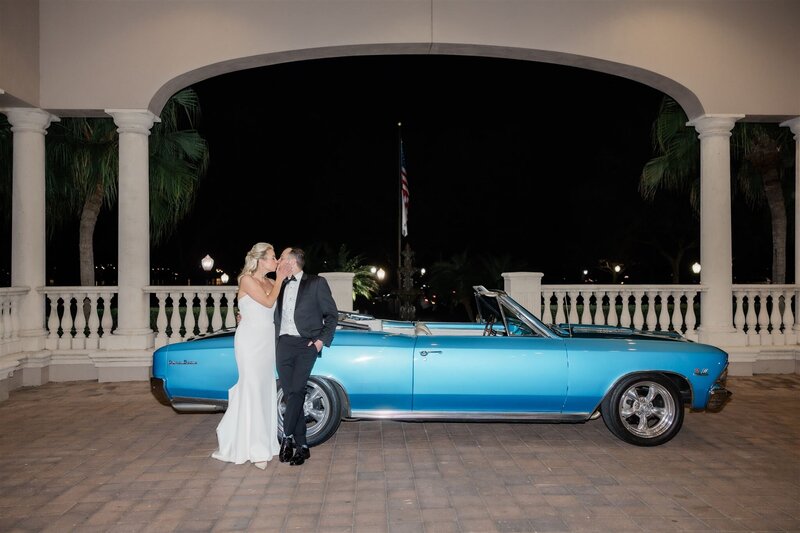 Wedding reception getaway car at the country club of Orlando by orlando wedding photographer 