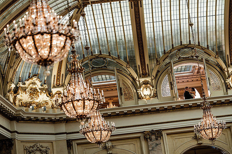 Palace Hotel Garden Court with ornate glass ceiling and crystal chandeliers - San Francisco wedding photographer