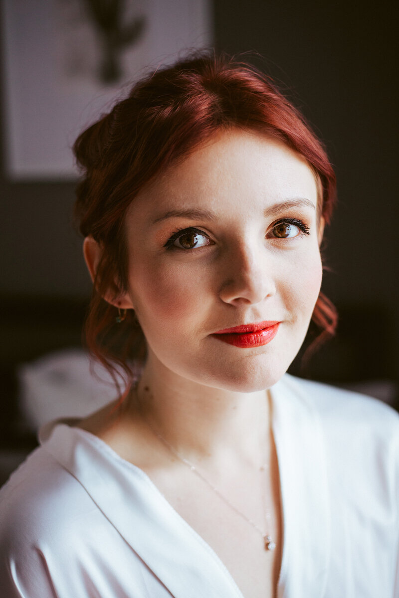 bride with red hair and red lipstick
