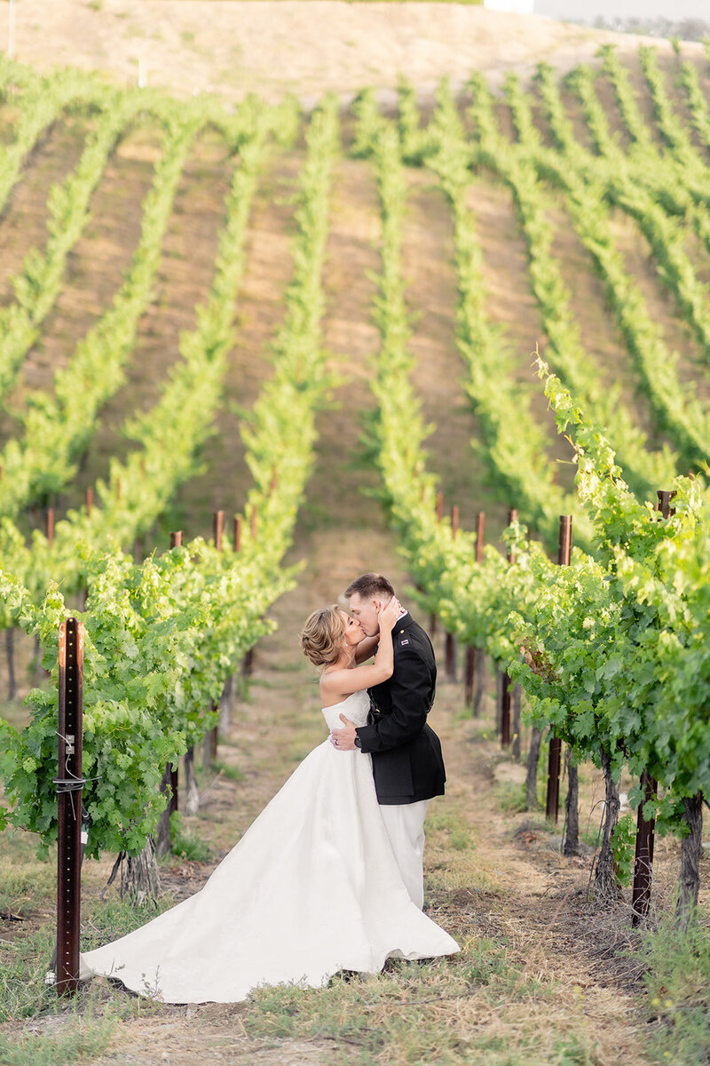 Bride and groom kissing at destination wedding in Marthas Vineyard