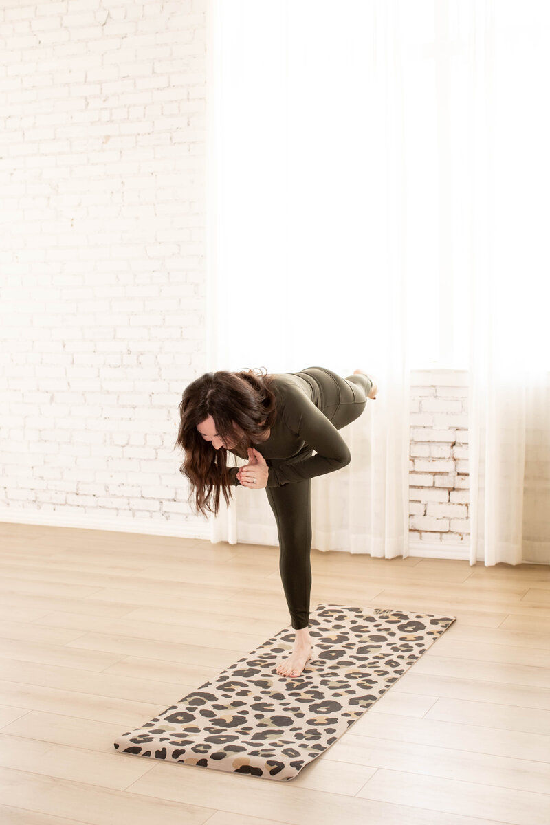 Woman in a yoga pose, representing balance in the journey through Hashimoto's and perimenopause