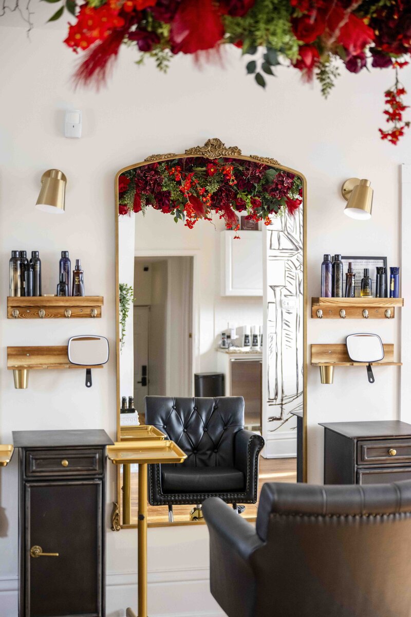 Black leather salon chair in salon and spa studio