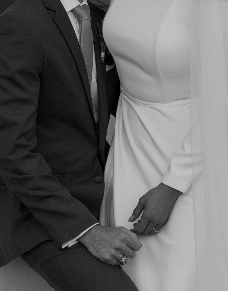 Bride and groom walk up memorial steps at their DC wedding