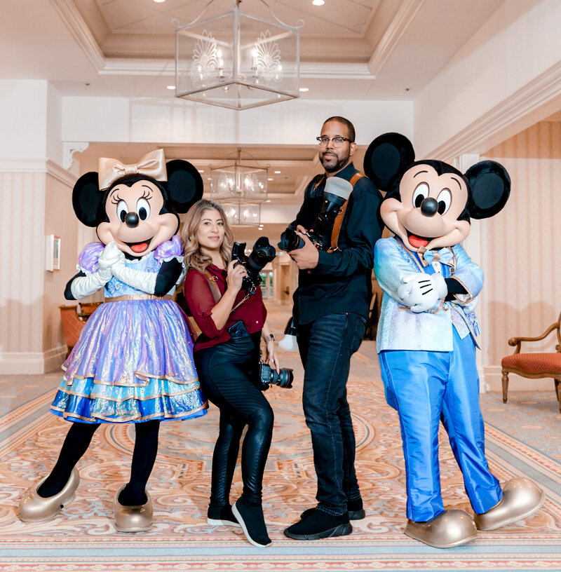 Bella Grey Photography posed with Mickey and Minnie Mouse