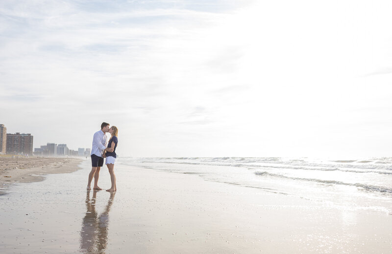 couple kissing on beach ventor new jersey