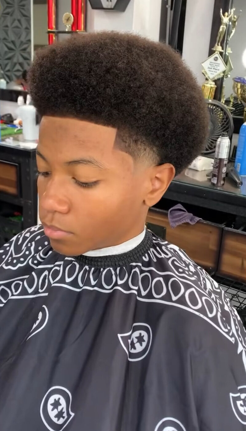 A finished fade haircut with a great blend at Onyx Barbershop in Wildomar, CA.