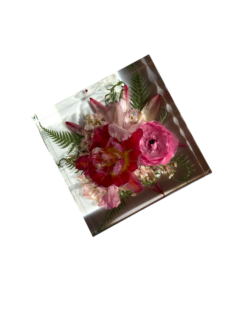 bright wedding flowers perfectly preserved in book end resin blocks 