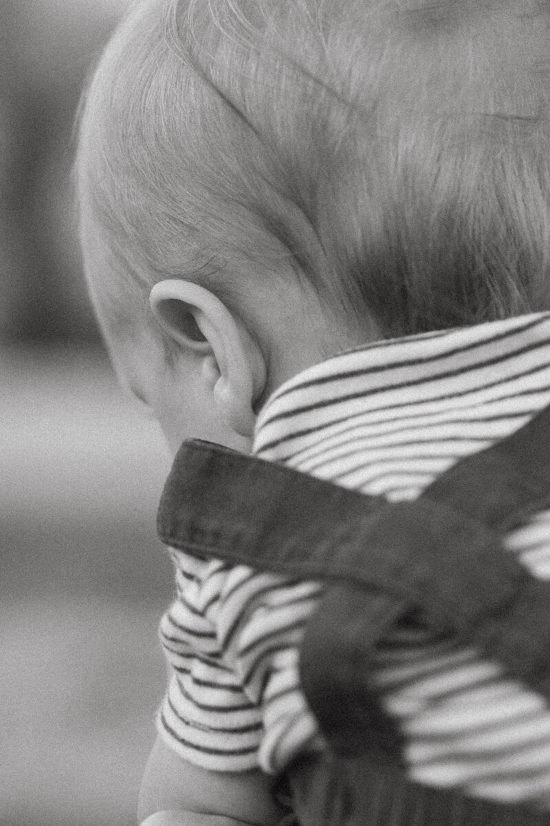 A newborn baby boy's adorable little features captured by a lifestyle photographer in Lebanon, Oregon, during the early days of infancy.
