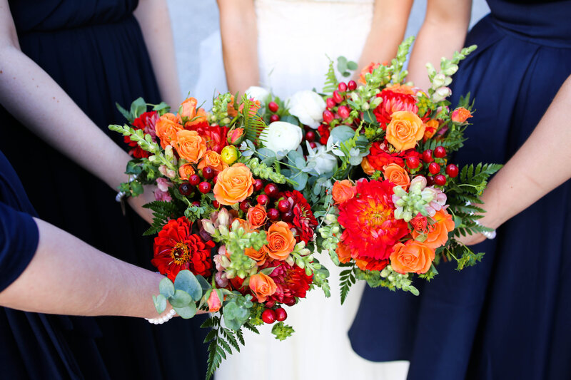 Bride and Bridesmaids flowers, they are all holding them | Acadia Wedding