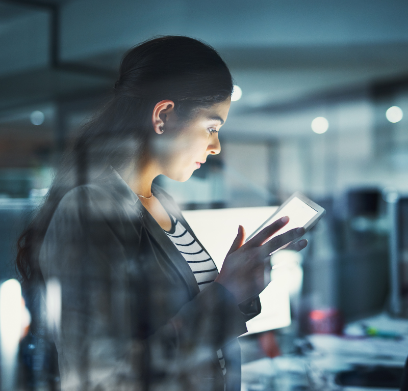 Female working from home on her phone.