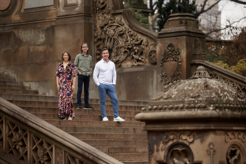 A modern family moment set against the timeless beauty of Central Park's iconic architecture. Effortless style, quiet connection, and a backdrop that speaks to legacy—this portrait captures both where they are now and the story they’re building together.

