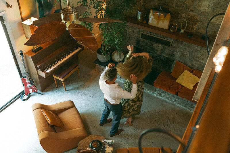 couple dancing in living room during at home couples photos, captured by Elsie Goodman, an NYC couples photographer