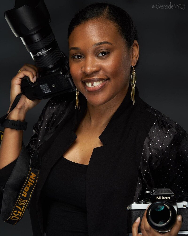 Women holding a camera