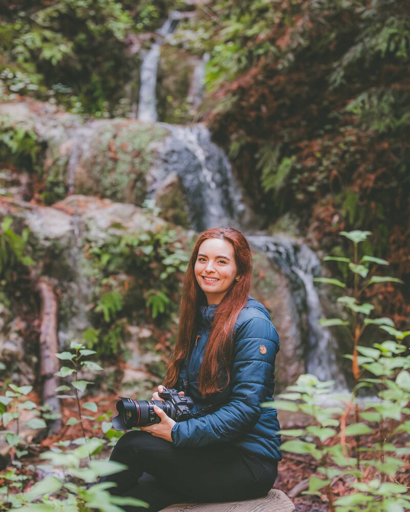 Heather of Seeking Venture Photo poses in Big Sur.