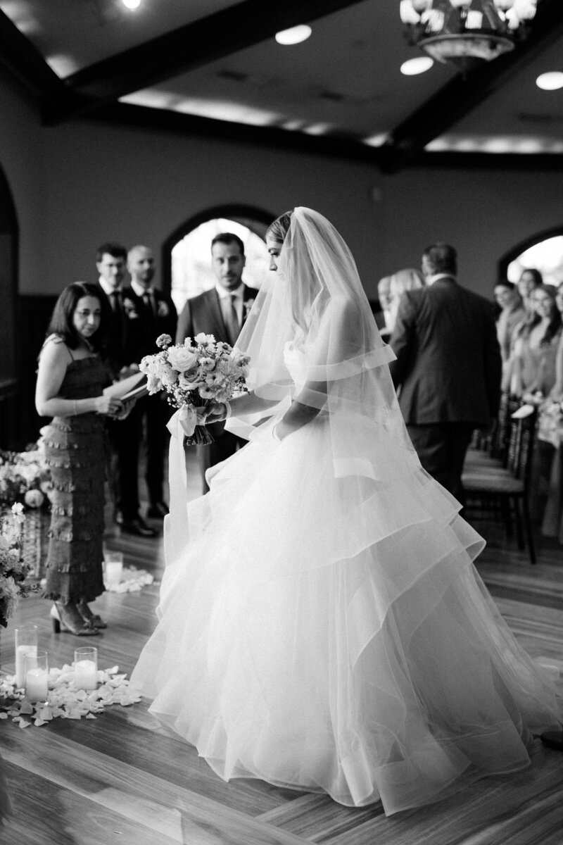 Bride and groom exit ceremony at Glen Foerd Estate in Philadelphia, PA