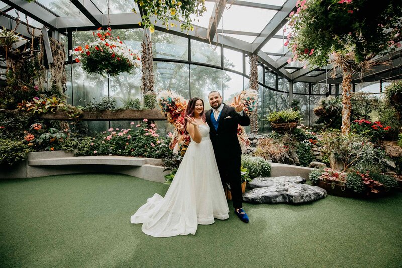 Wedding calligrapher in DC enjoying whimsical garden