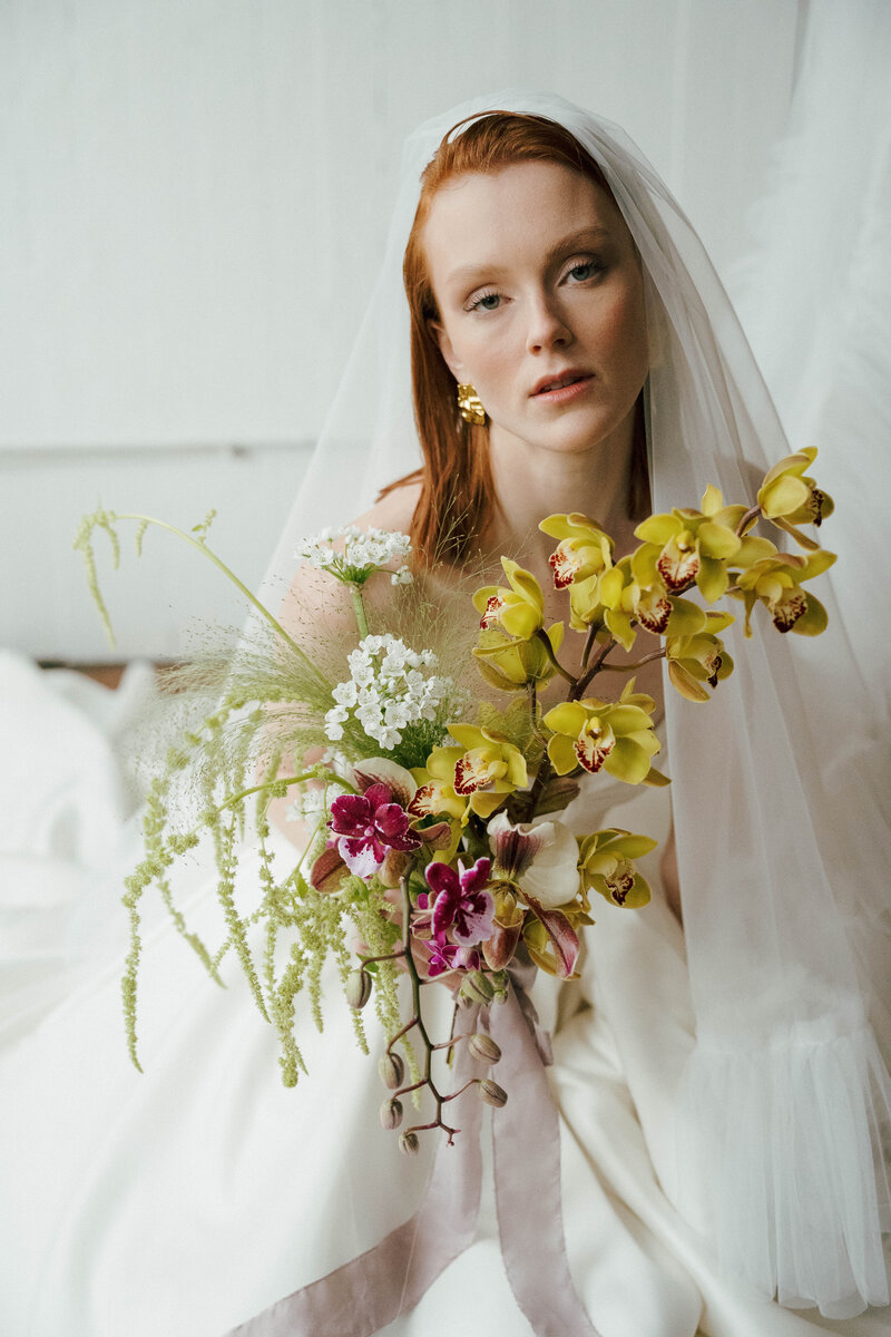 Bride in Ouma Bridal couture gown during a Vancouver wedding photoshoot.