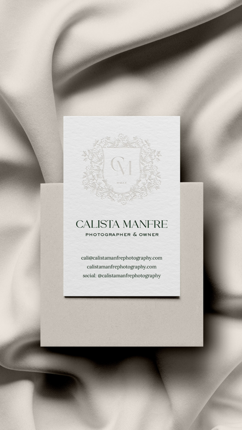 a mockup of a white business card with a neutral logo and black text