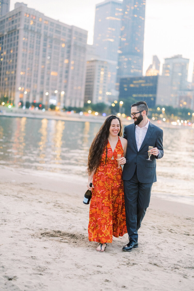 A summery Chicago engagement photo taken along the lakefront at sunset