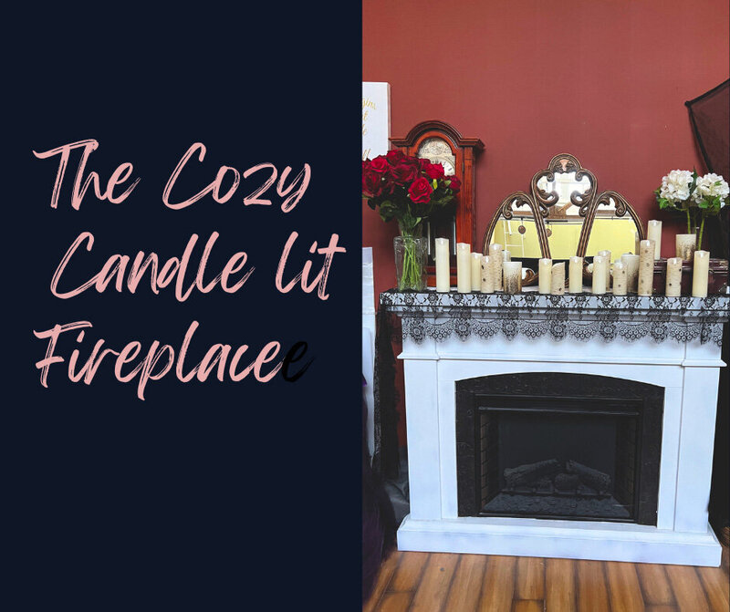 White fireplace topped with candles  to pose in front of for boudoir in Minneapolis Mn