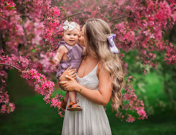 Pretty sisters sharing a moment at their family photo session in beautiful fall colors.