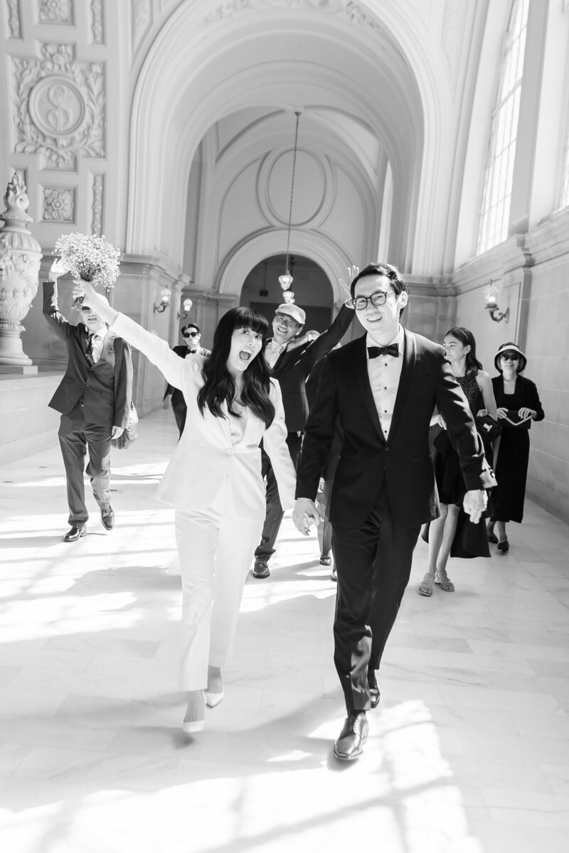 Couples walking down the hallway 