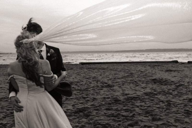 Bride and groom on the beach in Ballard