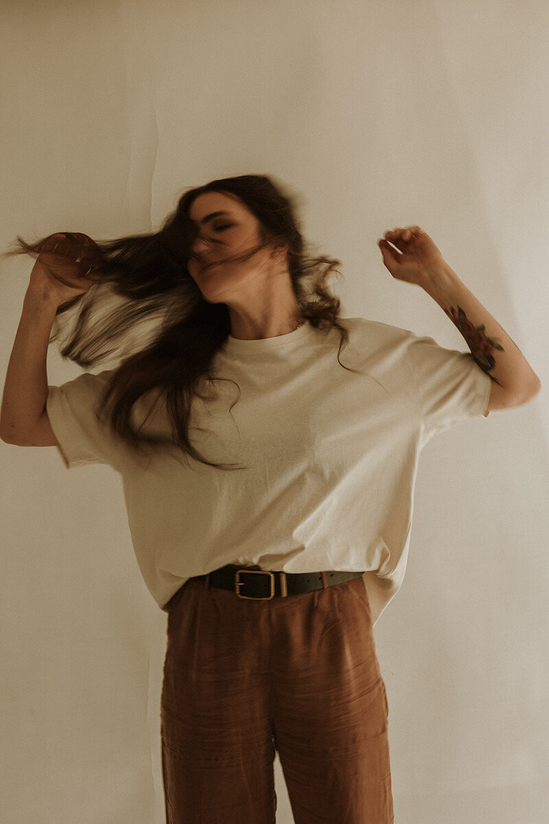 Playful branding photo by Sunshine Coast photographer capturing movement and personality.
