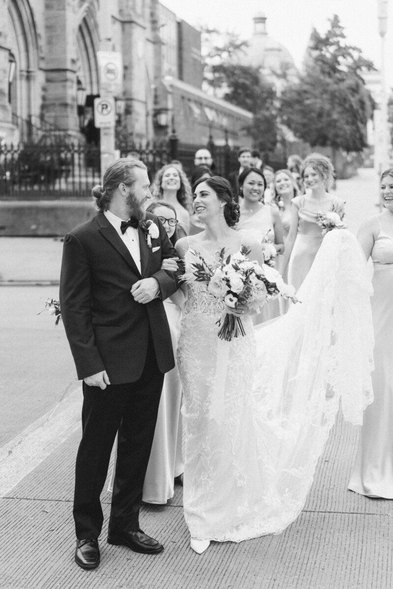 wedding couple with bridesmaids downtown Pittsburgh