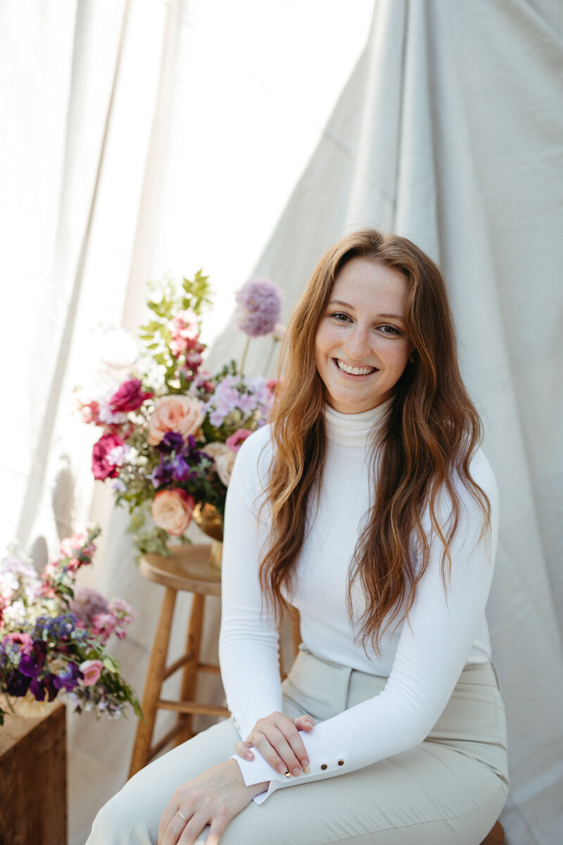 Mackenzie LePage, Rosemary and Finch floral design associate floral designer, wedding and event floral design in Nashville, TN and travel weddings, florist. Floral hues of purple, lavender, pink, magenta, peach, and emerald.