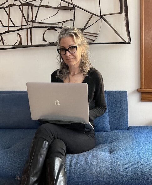 minneapolis marketing consultant barbara gates on blue couch