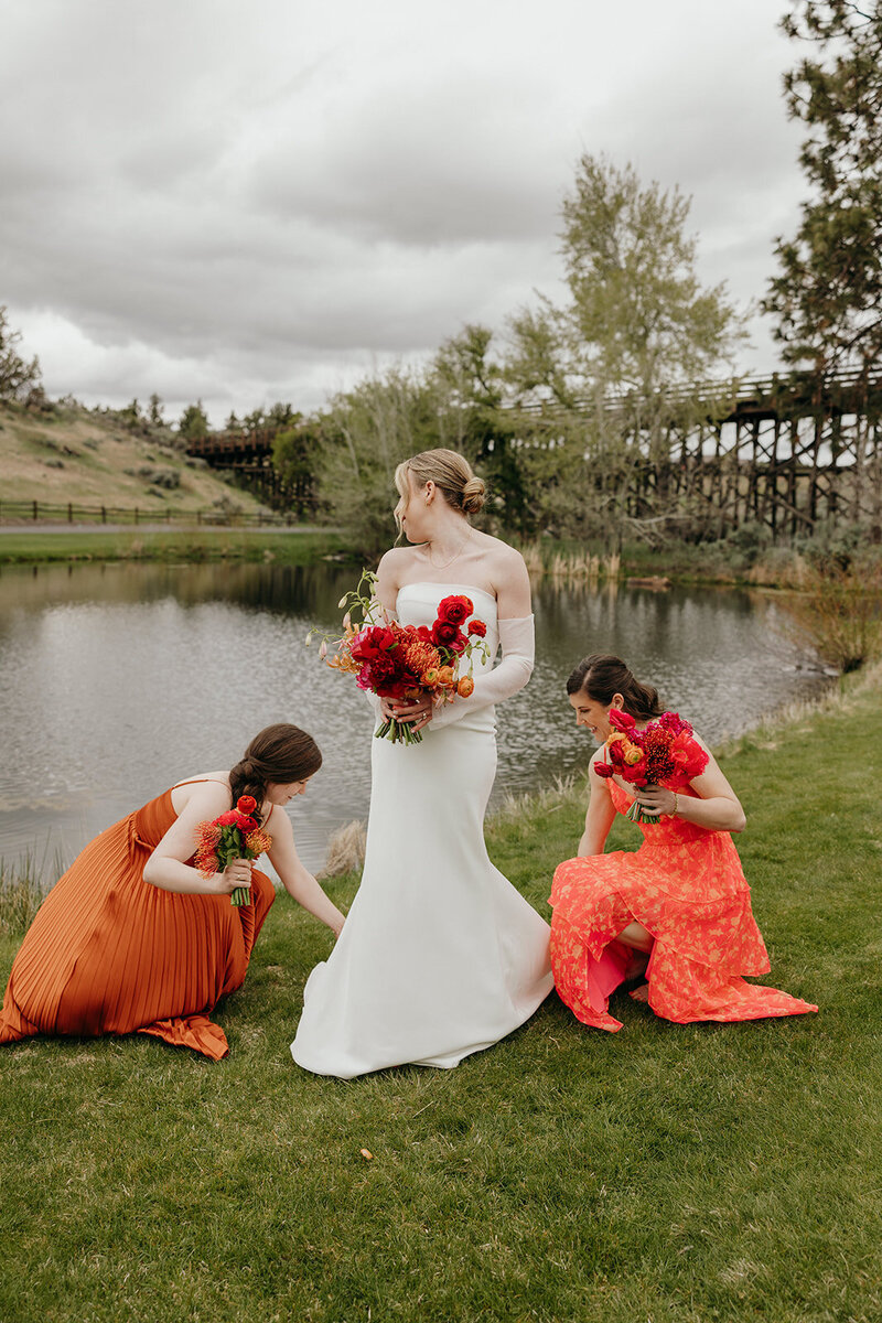 Spring wedding bouquet with protea, lilies, and garden roses