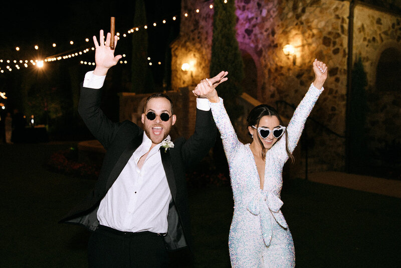 bride and groom dancing with sunglasses at bella collina wedding florida​