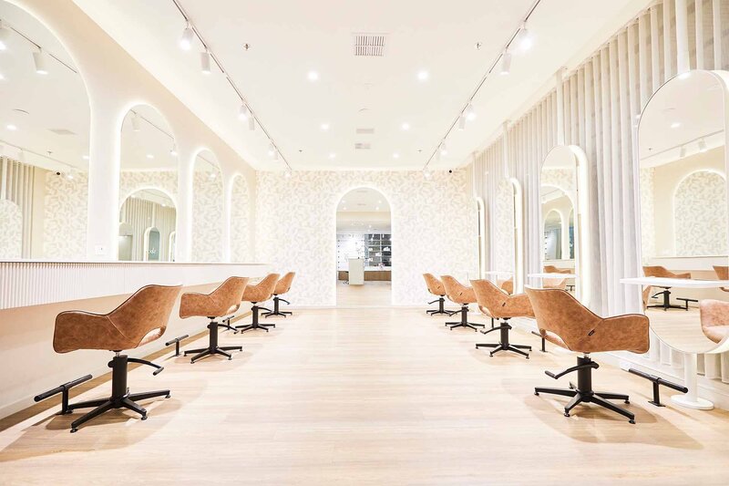 Bright and spacious salon interior with modern design, showcasing professional hair treatment services on Sydney's North Shore.