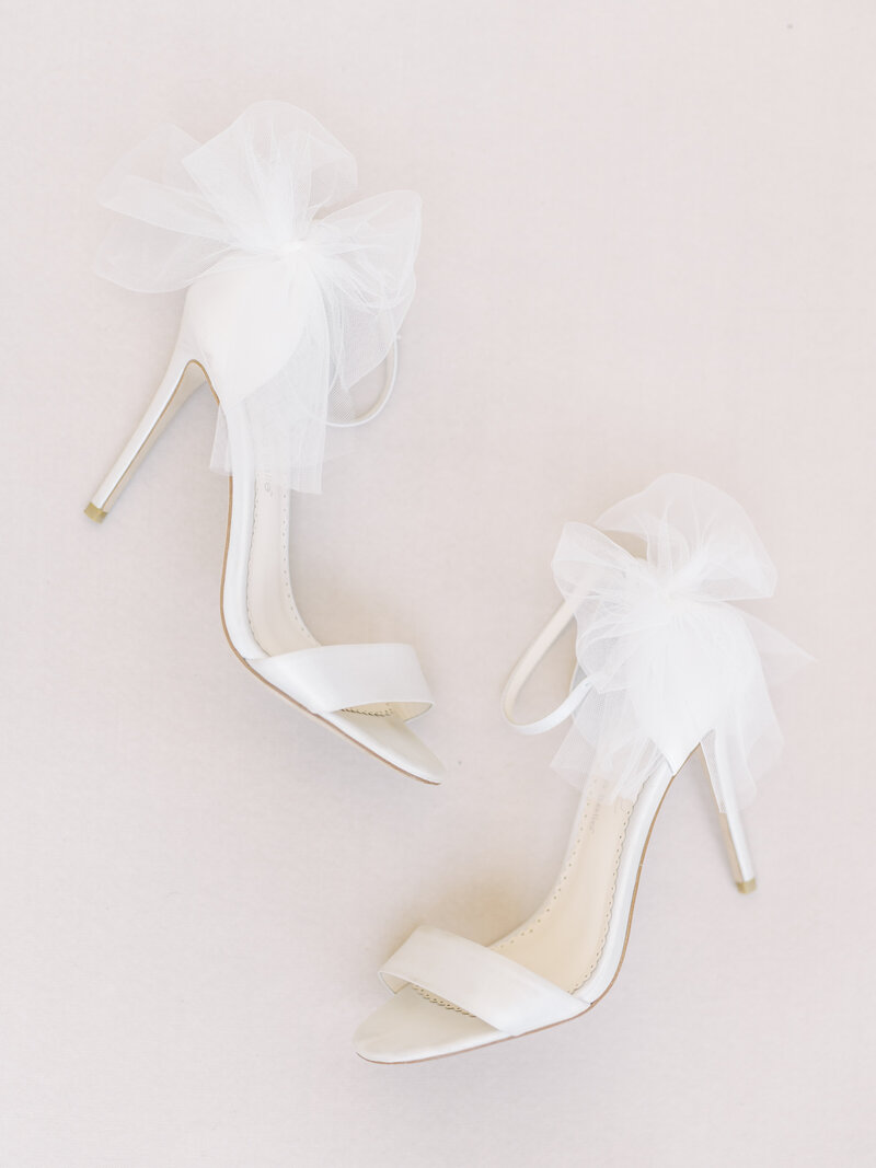 white-wedding-shoes-with-bows