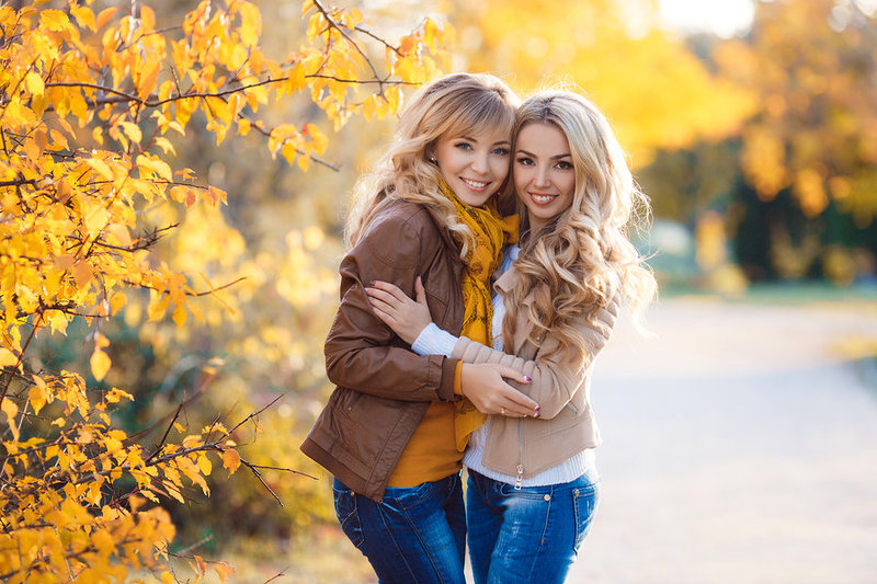 bigstock-Two-beautiful-blonde-in-autumn-110296574