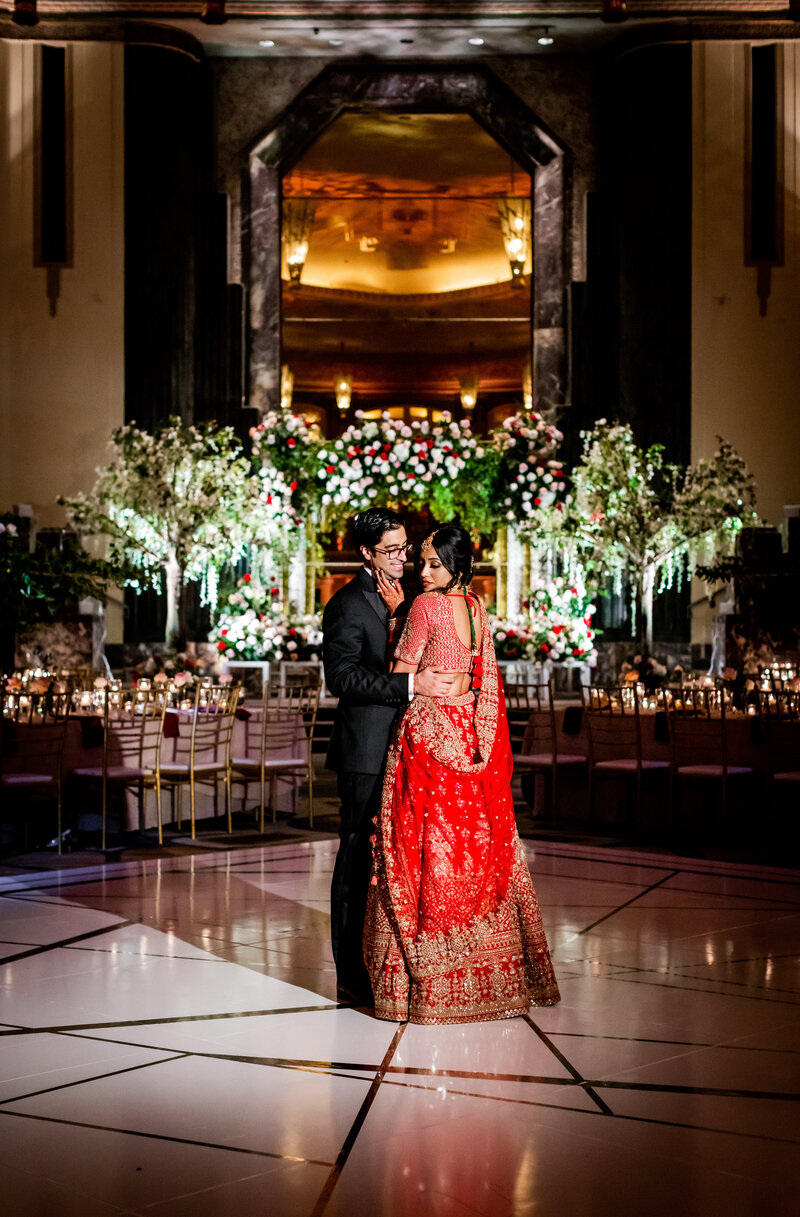 Step into the lavish world of Nisha and Keshav’s wedding celebration at the Hilton Cincinnati, where every detail reflects their sophisticated taste and cultural heritage. This stunning gallery showcases the couple's big day, featuring exquisite decor, vibrant festivities, and moments of heartfelt joy. The Hilton’s grand ballroom transformed into a breathtaking venue with its elegant chandeliers and sumptuous settings, creating the perfect atmosphere for an unforgettable wedding. Ideal for those who dream of a wedding that combines luxury with personal charm, discover how the Hilton Cincinnati can bring your vision to life with unmatched style and grace.