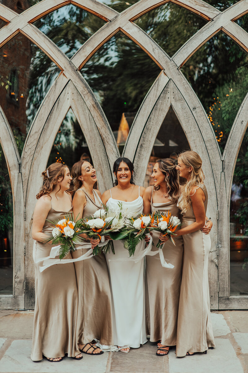 bride with bridal squad with their bouquets